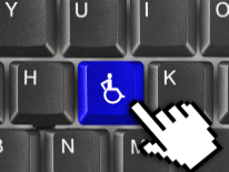 Closeup of keyboard with a wheelchair key being pressed